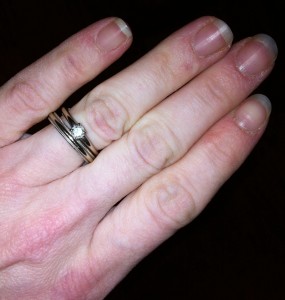 Don't mind the "she needs a manicure" state of my hands, please. THIS is my wedding band set.