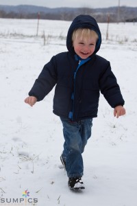 This is pretty much how Jed looks almost all the time.  Running and giggling.