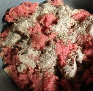 Ground pork and spices in a bowl, ready for mushing!  I'm doing 2 pounds here.