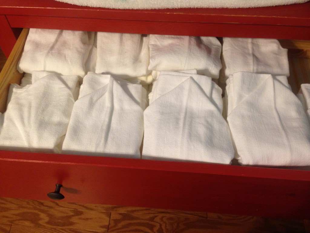 A drawer full of diapers ready to use.