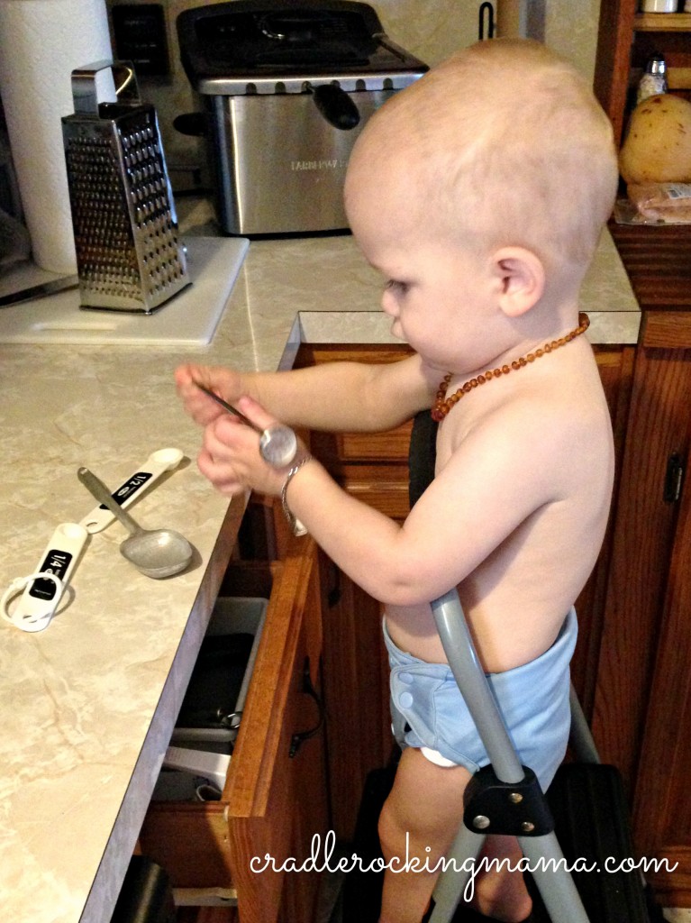 Zac finally getting to explore the kitchen during living room construction! He's never been allowed to wander in the kitchen at all, and he enjoyed playing with tupperware and my baking spoons! 