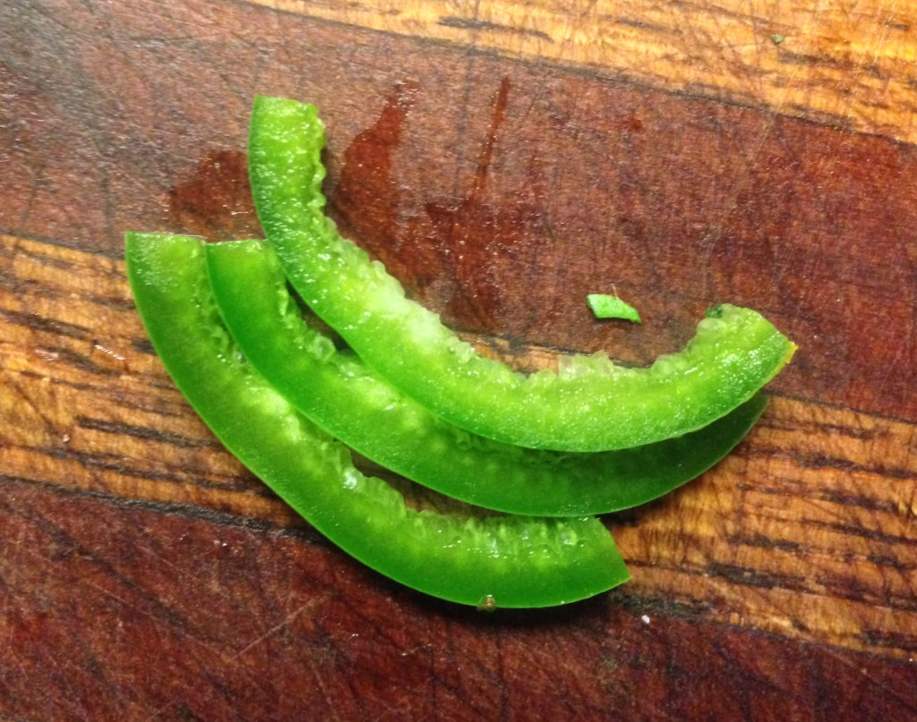 Three strips of 1/2 of a jalapeno. That's all my fellas can handle. 