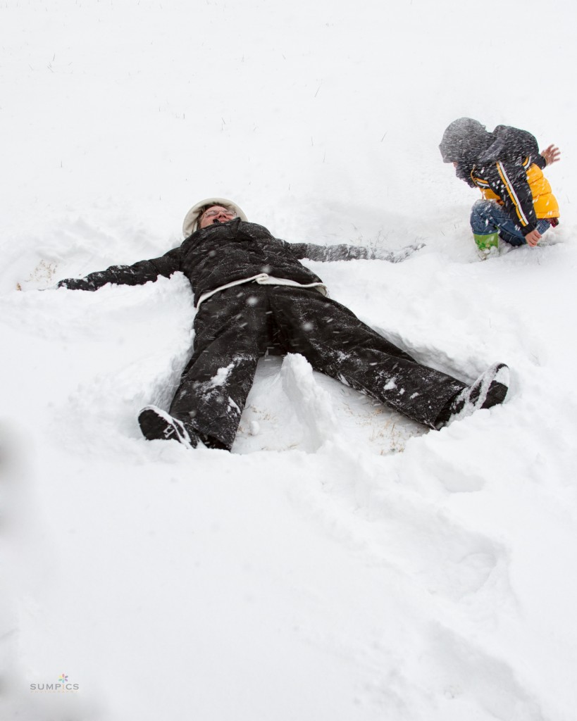 I enjoyed making a snow angel...until Jed dumped snow on my face! 