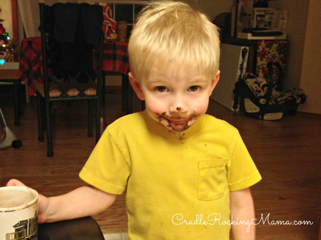Chocolate face, happy toddler! Yummy!