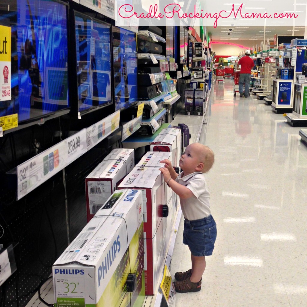 We do NOT watch sports in our house. Ever. EVER. But at Target, they were playing football games on the TV screens, and Zac. was. mesmerized. Uh-oh. I think I'm going to wind up actually watching sports on TV someday. Ugh.
